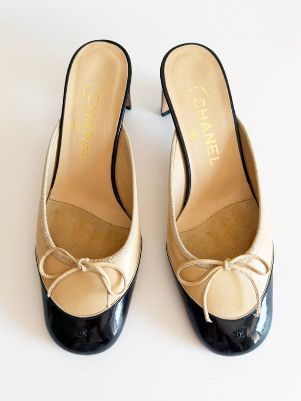 CHANEL Beige & Black Patent Leather Cap-Toe Bow Mules | EU 36.5 | Early 2000s